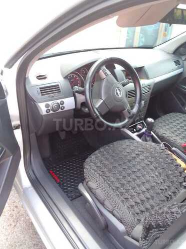 Opel Astra 2006, 298,657 km - 1.4 l - Naftalan