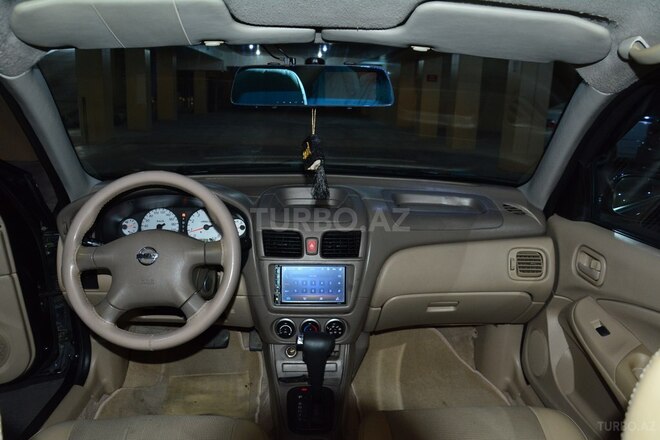 Nissan Sunny 2009, 345,000 km - 1.3 л - Bakı
