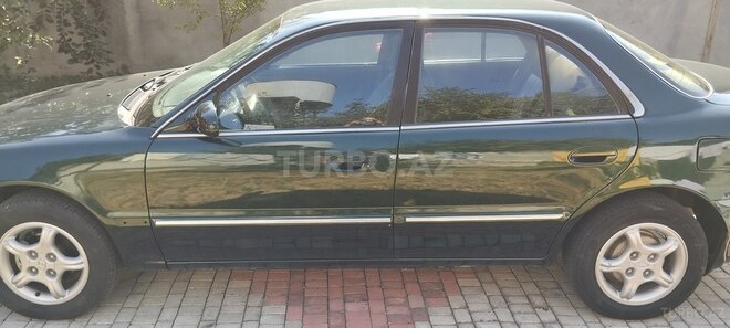 Hyundai Sonata 1998, 328,707 km - 2.0 l - Şəki