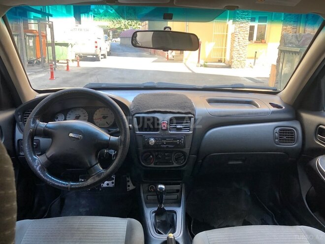 Nissan Sunny 2006, 320,000 km - 1.3 l - Bakı