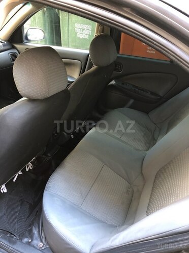 Nissan Sunny 2006, 320,000 km - 1.3 l - Bakı