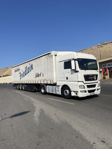 MAN TGX 18.440 2010, 950,881 km - 12.0 l - Bakı