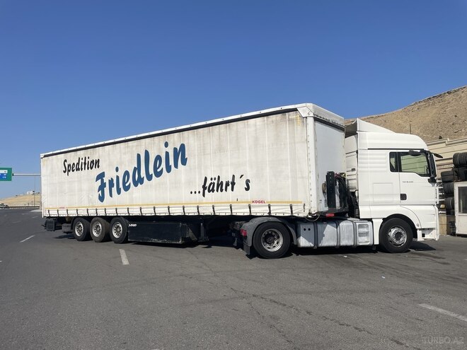 MAN TGX 18.440 2010, 950,881 km - 12.0 l - Bakı