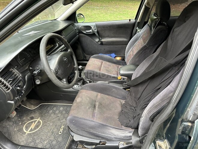 Opel Vectra 1999, 474,000 km - 1.6 l - Quba