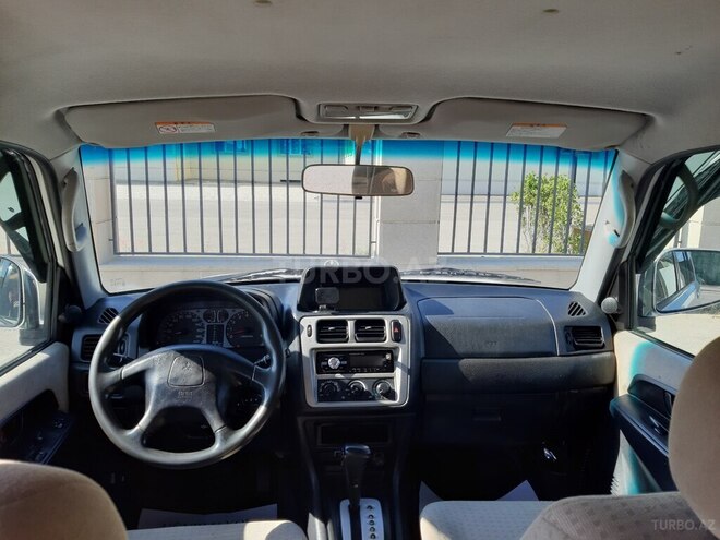 Mitsubishi Pajero io 2001, 290,000 km - 2.0 l - Bakı