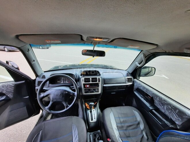 Mitsubishi Pajero io 1999, 325,123 km - 1.8 l - Sumqayıt