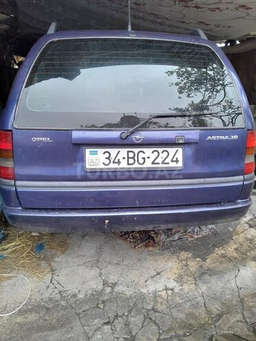 Opel Astra 1997, 350,000 km - 1.4 л - Qax