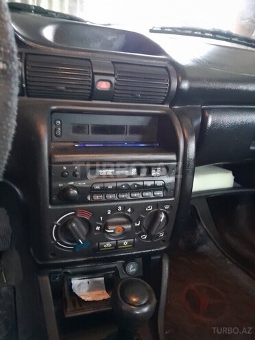 Opel Astra 1997, 350,000 km - 1.4 л - Qax