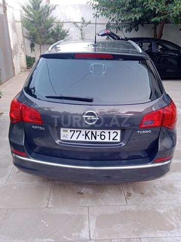 Opel Astra 2014, 206,000 km - 1.6 л - Bakı