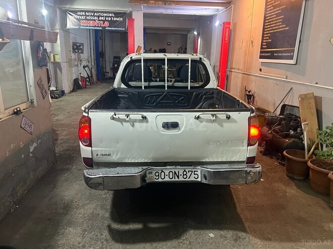 Mitsubishi L200 2009, 210,000 km - 2.5 l - Bakı