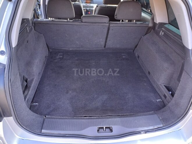 Opel Astra 2009, 222,000 km - 1.4 l - Qax