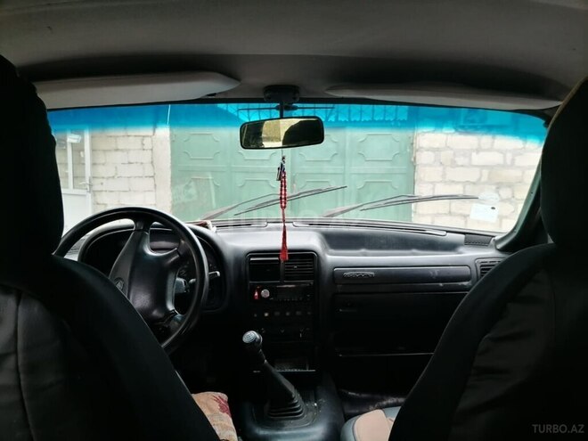 GAZ 31105 2004, 380,764 km - 2.4 l - Quba