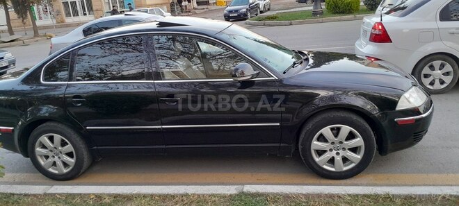 Volkswagen Passat 2004, 283,053 km - 1.8 l - Yevlax