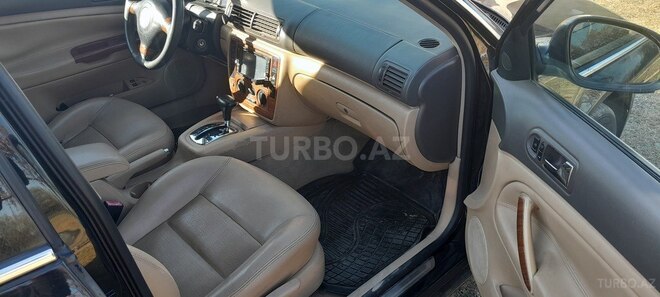 Volkswagen Passat 2004, 283,053 km - 1.8 l - Yevlax