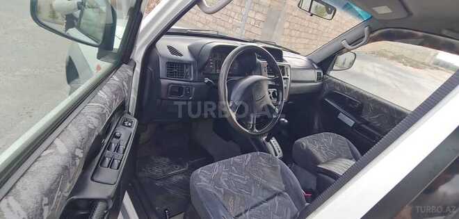 Mitsubishi Pajero io 1998, 255,000 km - 1.8 l - Bakı