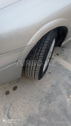 Nissan Sunny 2006, 395,000 km - 1.3 l - Bakı