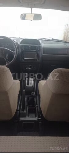 Mitsubishi Pajero io 2004, 280,400 km - 2.0 л - Ağcabədi