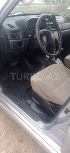 Mitsubishi Pajero io 2004, 280,400 km - 2.0 л - Ağcabədi