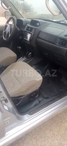 Mitsubishi Pajero io 2004, 280,400 km - 2.0 л - Ağcabədi