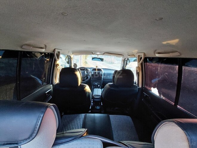 Mitsubishi Pajero io 2004, 301,063 km - 2.0 л - Bakı