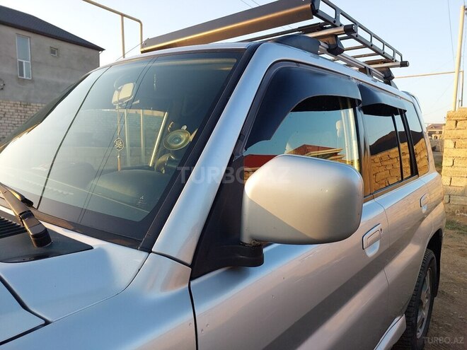 Mitsubishi Pajero io 2004, 301,063 km - 2.0 л - Bakı