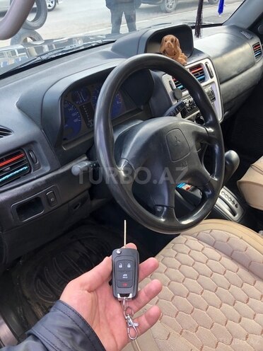 Mitsubishi Pajero io 1999, 204,000 km - 2.0 l - Bakı
