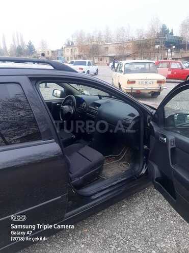 Opel Astra 1999, 300,000 km - 1.6 l - Yevlax