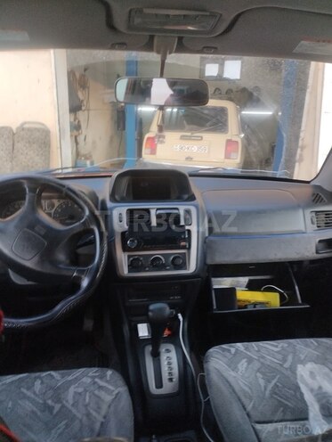 Mitsubishi Pajero io 1999, 100,000 km - 1.8 l - Bakı