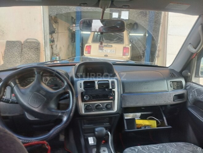Mitsubishi Pajero io 1999, 100,000 km - 1.8 l - Bakı