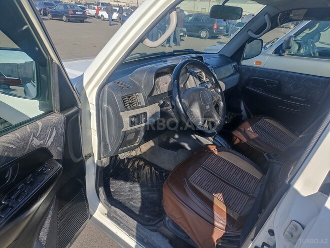 Mitsubishi Pajero io 1999, 250,000 km - 2.0 л - Bakı