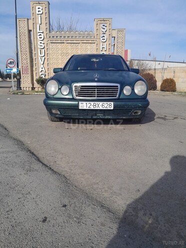 Mercedes E 220 1997, 304,999 km - 2.2 l - Biləsuvar