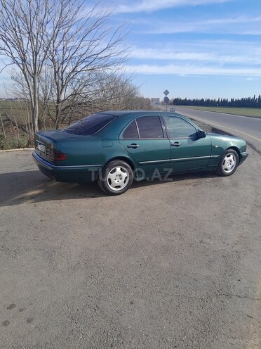 Mercedes E 220 1997, 304,999 km - 2.2 l - Biləsuvar
