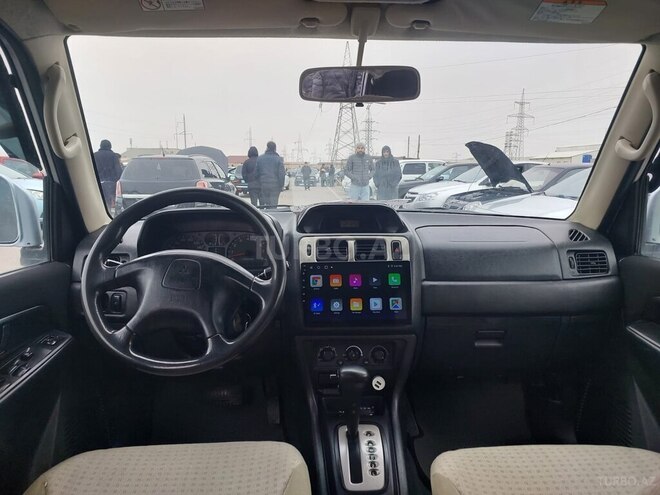 Mitsubishi Pajero io 2004, 301,063 km - 2.0 л - Bakı