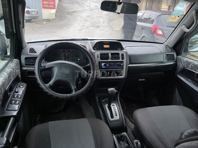 Mitsubishi Pajero io 1999, 242,990 km - 1.8 l - Bakı