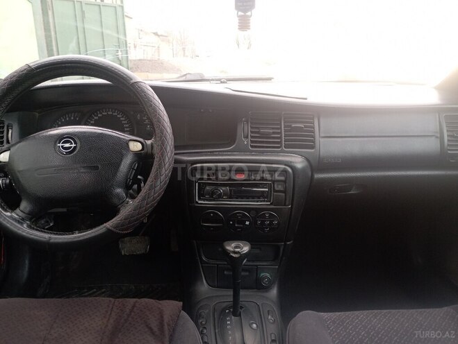 Opel Vectra 1998, 321,000 km - 1.8 l - Quba