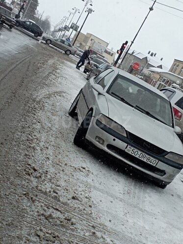 Opel Vectra 1998, 321,000 km - 1.8 l - Quba