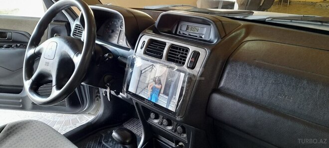 Mitsubishi Pajero io 2004, 227,612 km - 2.0 л - Siyəzən