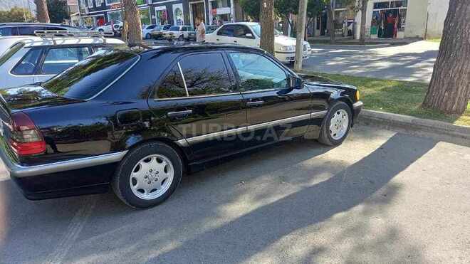 Mercedes C 230 1999, 418,429 km - 2.3 l - Qax