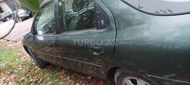 Ford Mondeo 1998, 562,093 km - 2.0 l - Qusar