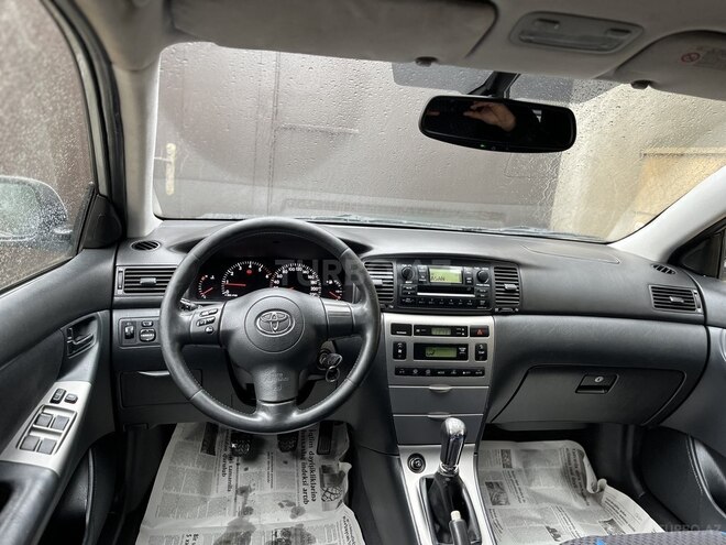 Toyota Corolla 2006, 226,000 km - 1.4 l - Bakı