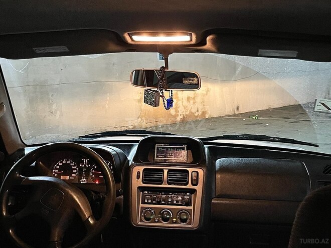 Mitsubishi Pajero io 2000, 100,000 km - 1.8 l - Bakı