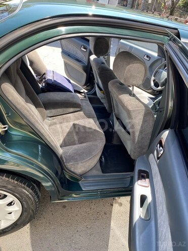 Nissan Maxima 1999, 292,580 km - 3.0 l - Qax