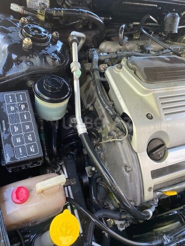 Nissan Maxima 1999, 292,580 km - 3.0 l - Qax
