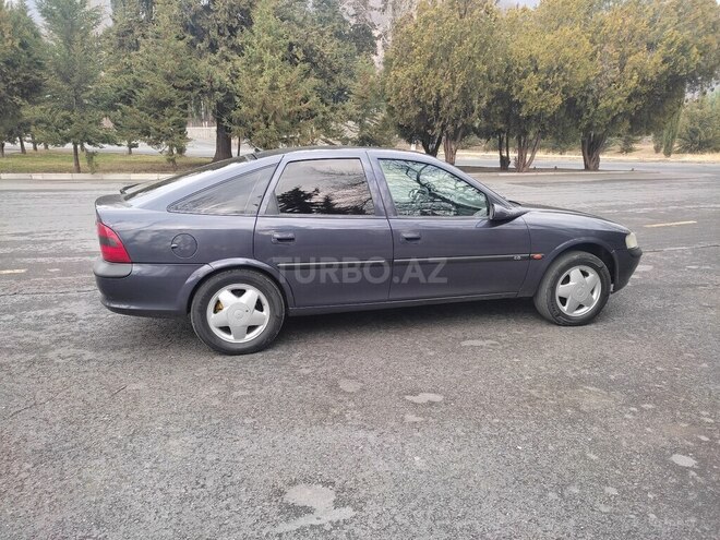 Opel Vectra 1997, 123,456 km - 1.8 l - Qax