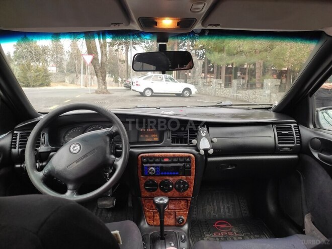 Opel Vectra 1997, 123,456 km - 1.8 l - Qax