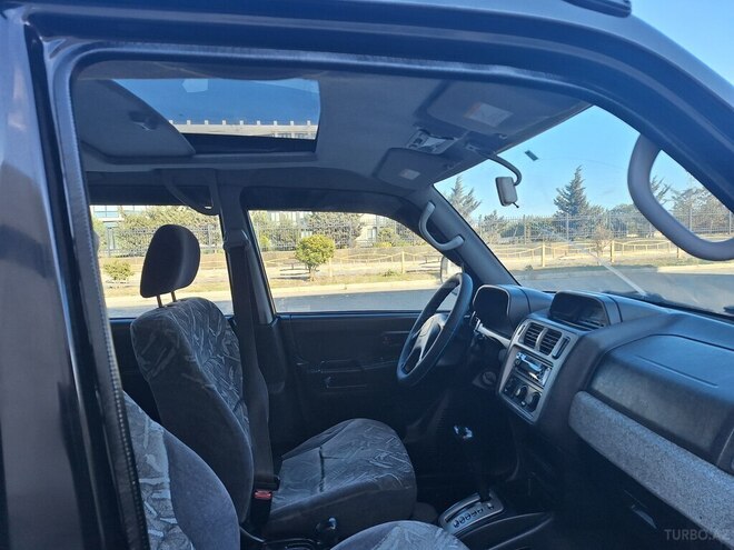 Mitsubishi Pajero io 1999, 242,000 km - 1.8 l - Bakı