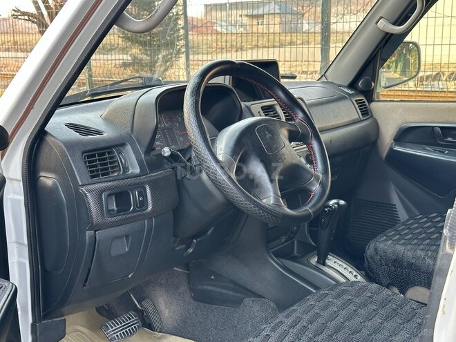 Mitsubishi Pajero io 2002, 311,000 km - 2.0 l - Bakı