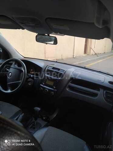 Kia Sportage 2009, 329,000 km - 2.0 l - Bakı