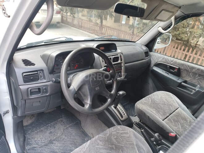 Mitsubishi Pajero io 1999, 262,167 km - 1.8 l - Bakı