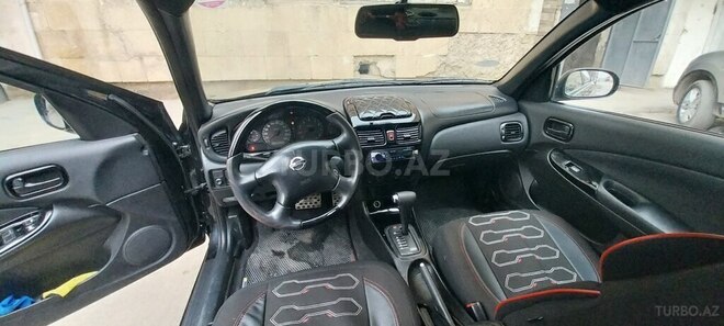 Nissan Sunny 2007, 264,000 km - 1.3 l - Bakı
